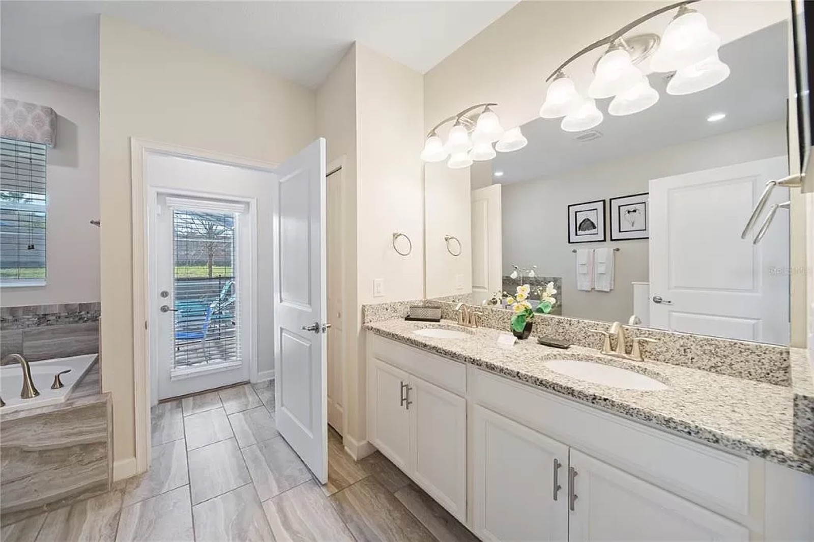 Primary suite bathroom with soaking tub